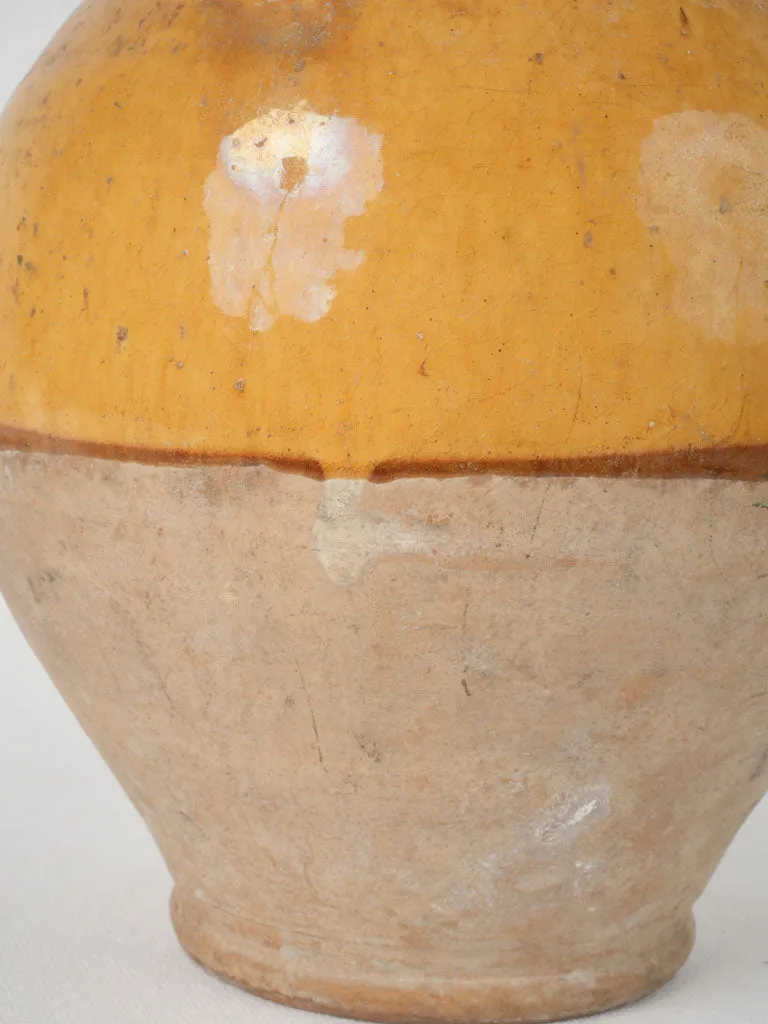 Antique French cruche w/ bright yellow demi glaze