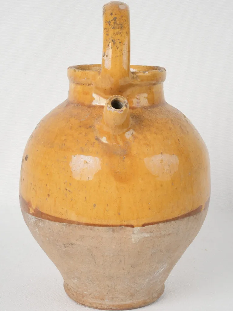 Antique French cruche w/ bright yellow demi glaze
