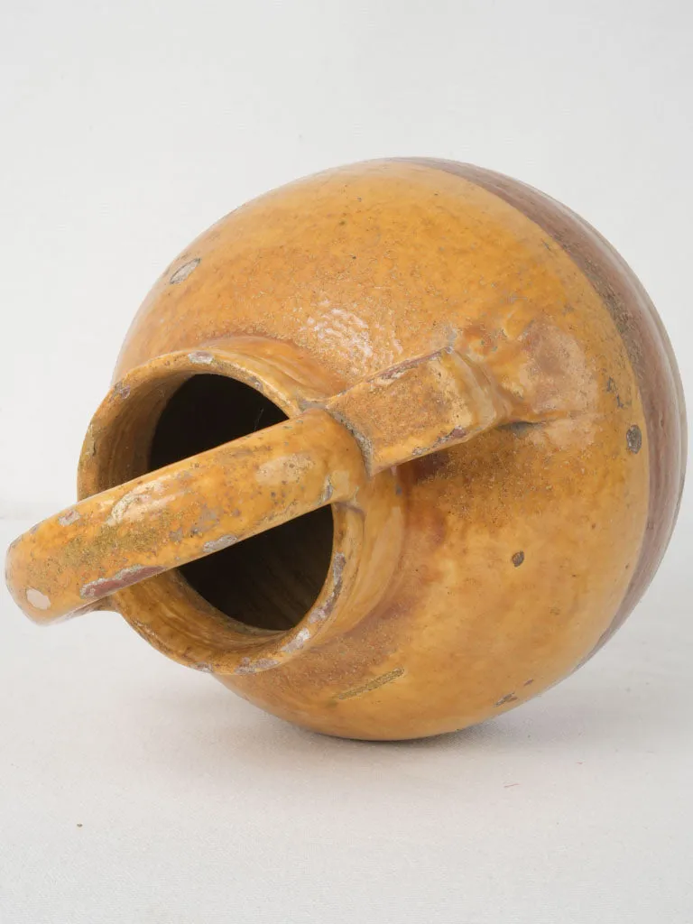 Antique French cruche w/ bright yellow demi glaze