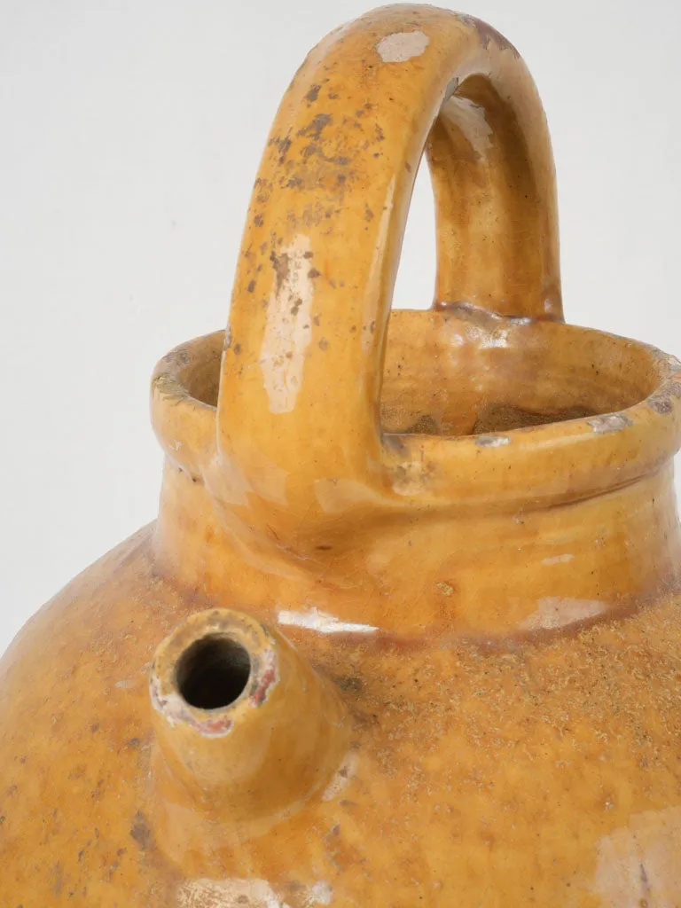 Antique French cruche w/ bright yellow demi glaze