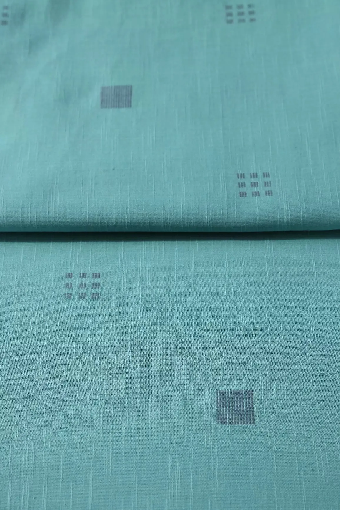 Grey And Teal Geometric Pattern On Handwoven Organic Cotton Fabric